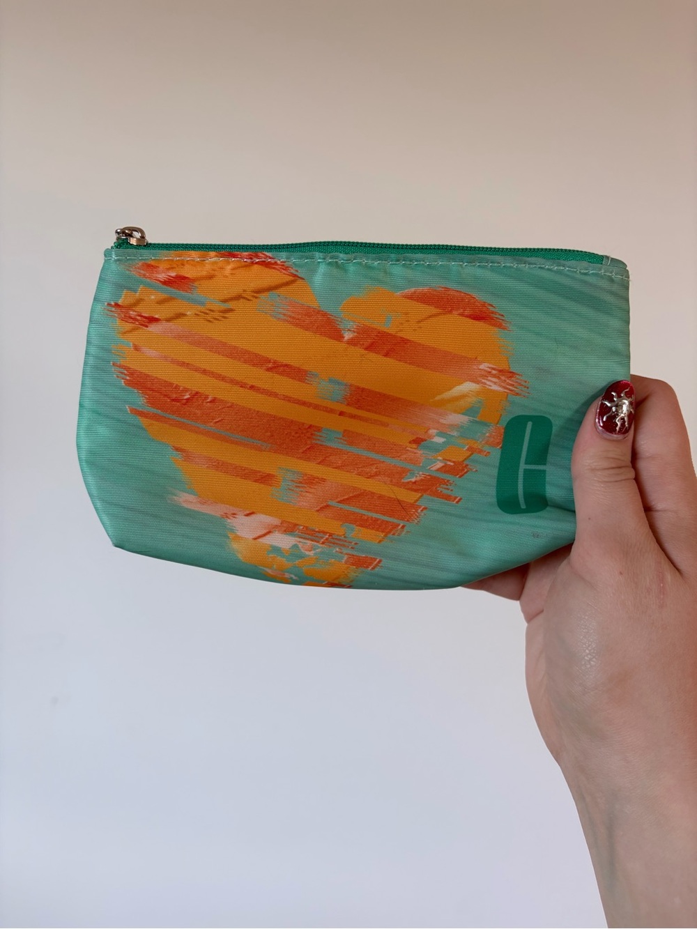 Clinique Teal Cosmetic Pouch with Orange Heart